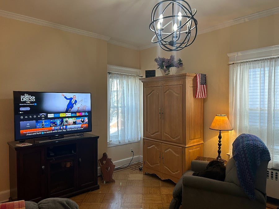 view of office/tv room upon entry.
Window to the left offers view of lovely back yard.