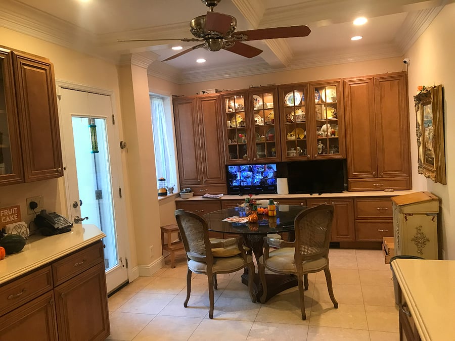 Kitchen dining area seats four or six. More chairs on hand.
Security camera monitor is on as shown revealing front, back and sides of exterior property and surrounding walkways. Cameras are in common hallways and office.