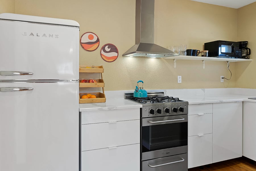 Clean new kitchen with gas range