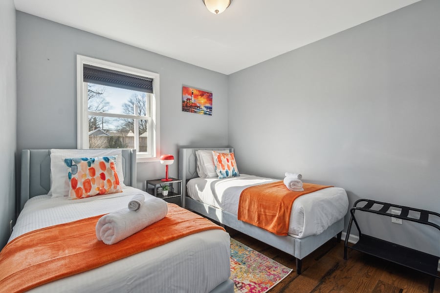 Unwind in the comfort of these twin beds, perfect for both kids and adults, dressed in luxurious linens for a restful nights sleep or a peaceful retreat.