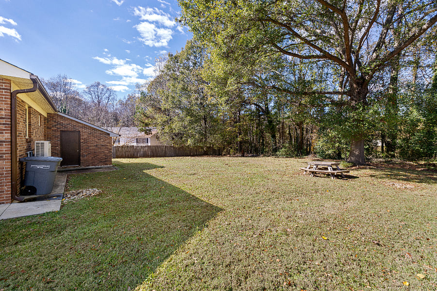 Unwind in the spacious backyardperfect for morning coffee, evening drinks, or simply soaking up the fresh air