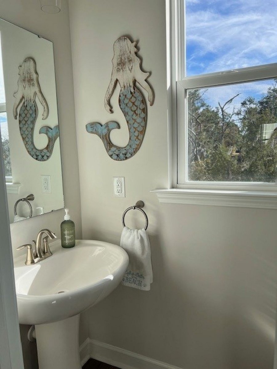Main level half bath with beautiful tidal creek views.
