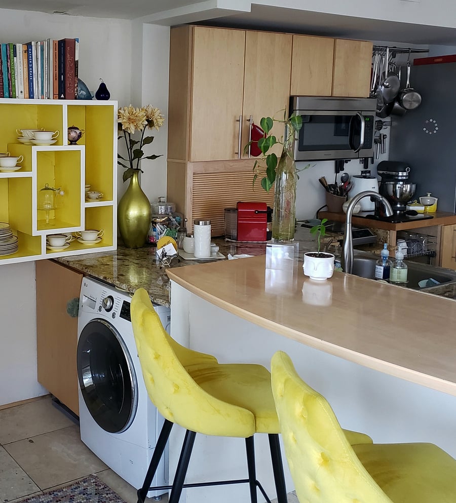 Bright front workspace and includes a LG washer/dryer combo