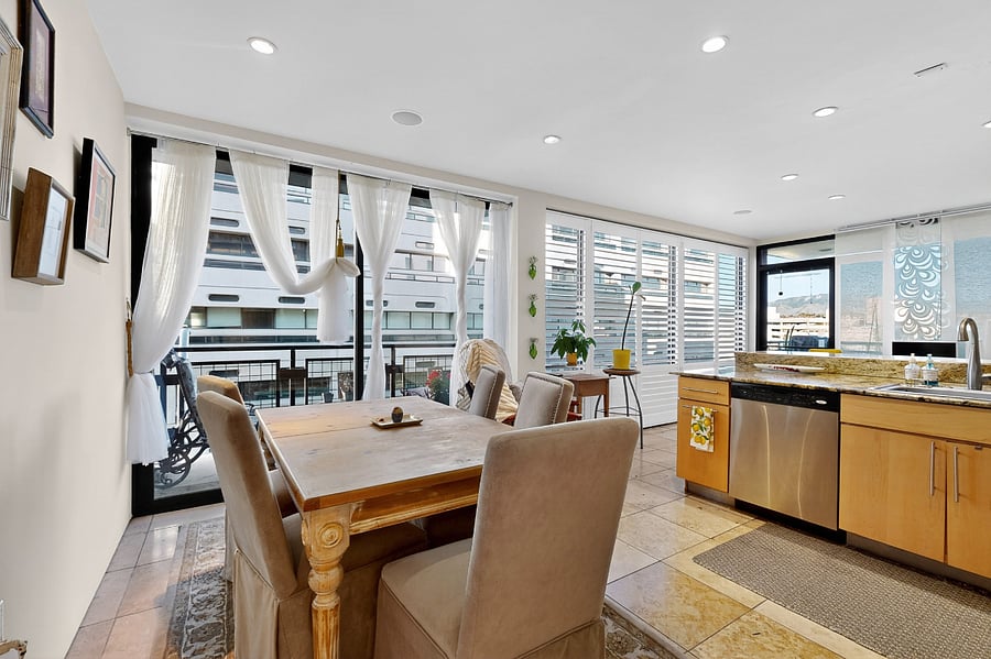 Bright font workspace and open kitchen and dining area
