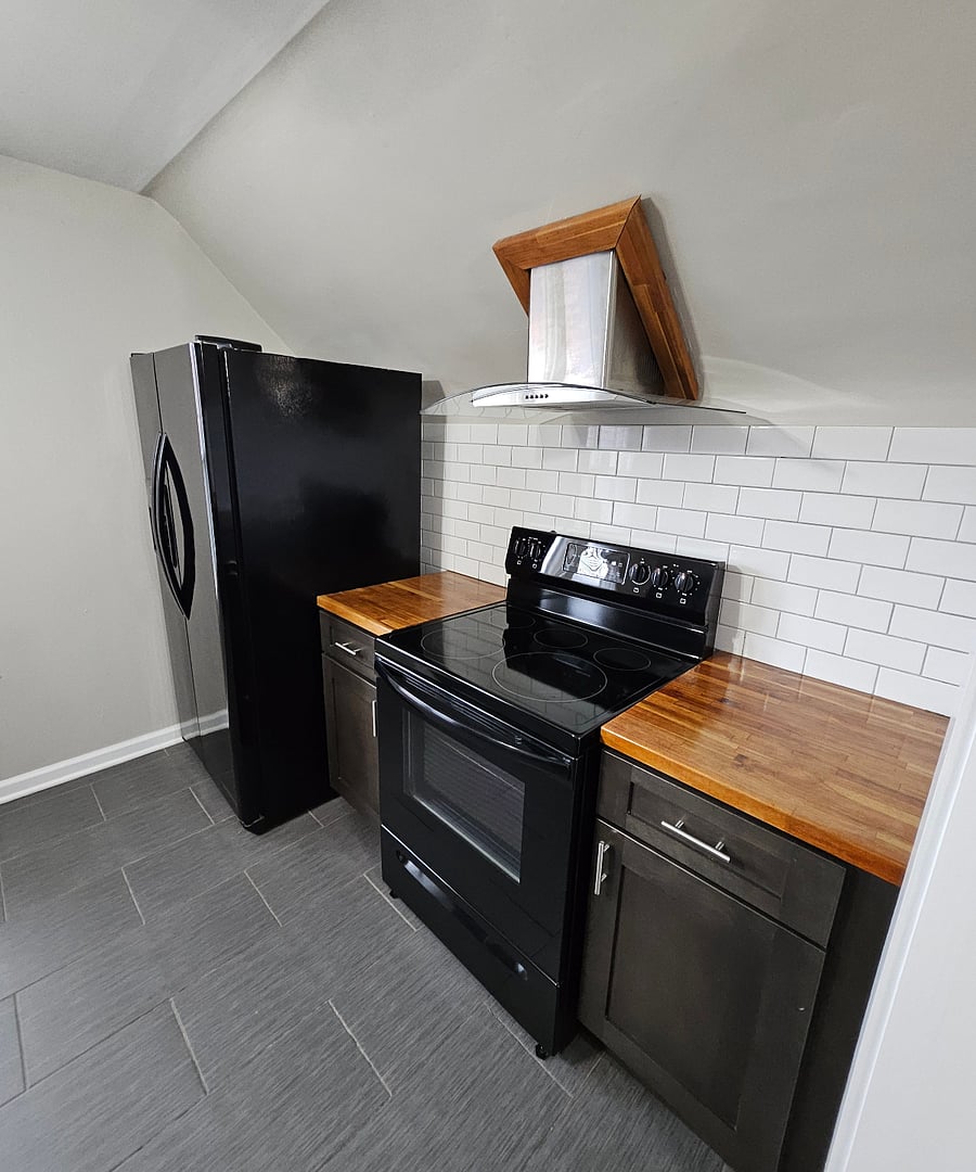 Modern & Functional: Sleek appliances and smart design make cooking here a breeze.