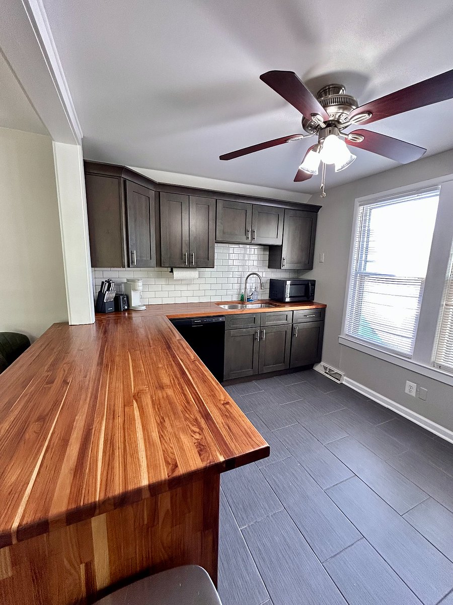 Bright & Open: A beautiful kitchen with lots of workspace and room to move around comfortably.