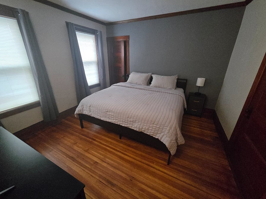 North Bedroom off the kitchen and near rear of home with King size bed.