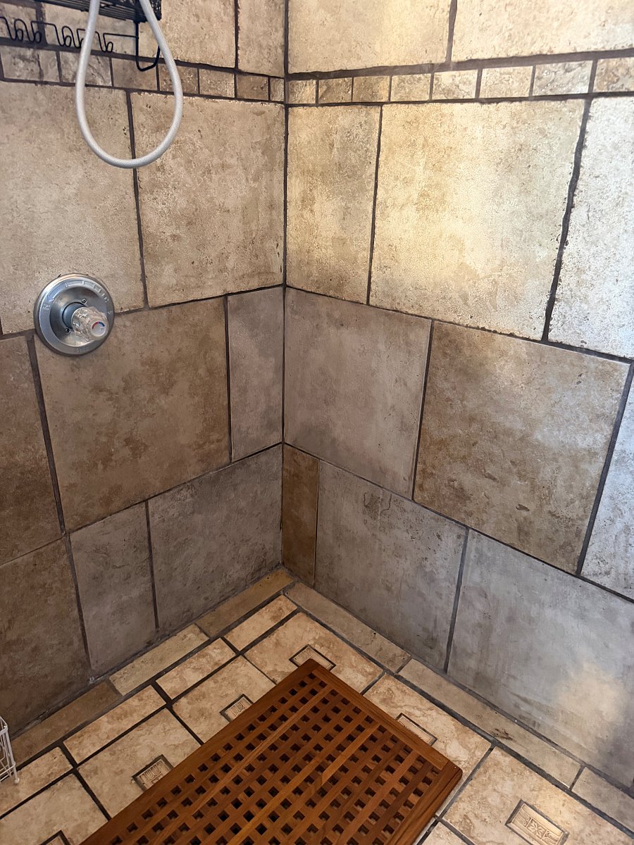 Huge indoor hot tile shower. 4 feet long by 3.5 feet wide!