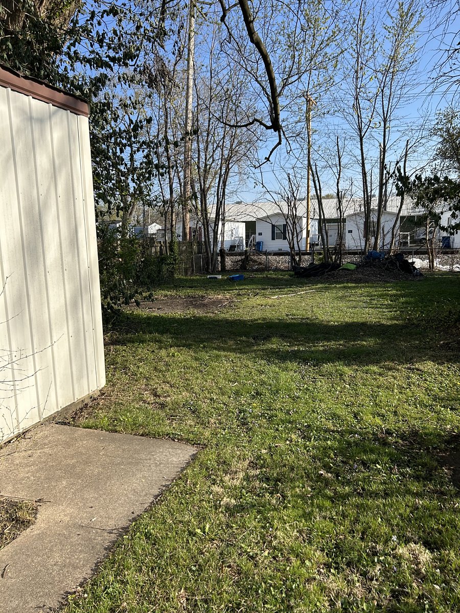 Fenced Back Yard with Fire Pit.
With Abandoned Railway in Back and Golf Course in Front - Quiet Neighborhood!