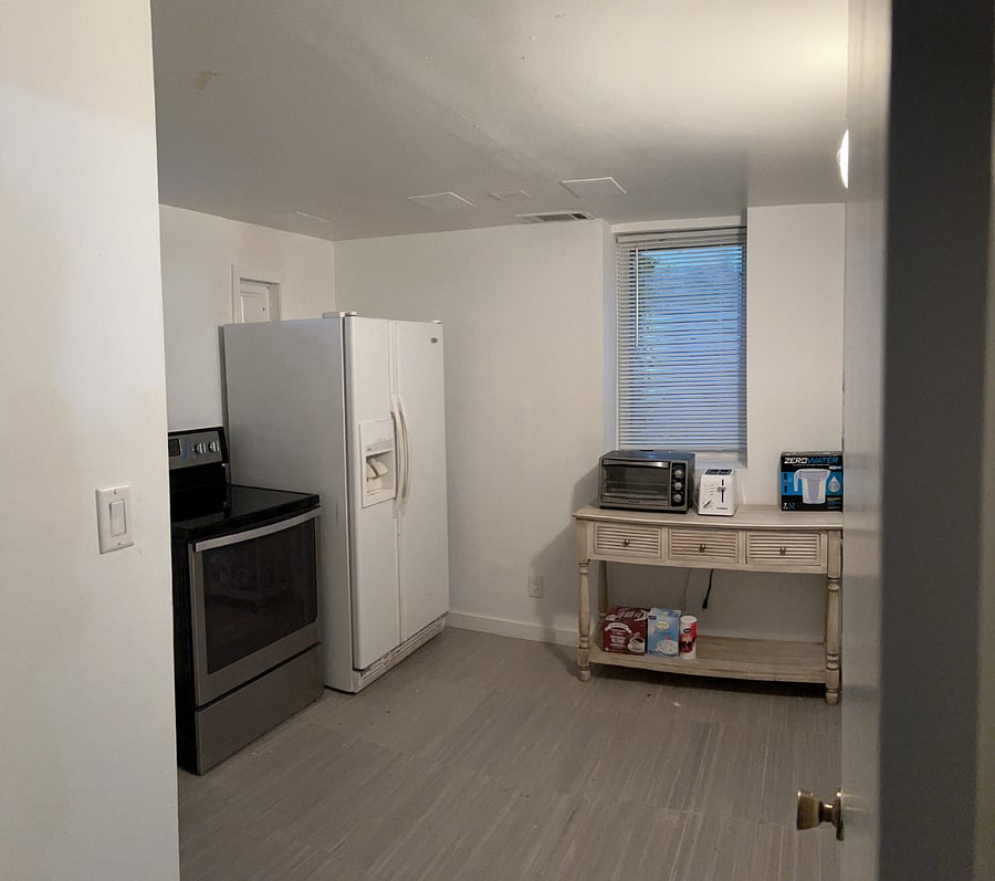 Kitchen Stocked with Basics. Don't Like Doing Dishes? - Got You Covered with a Supply Disposable Tableware for Your Entire Stay. Coffee Bar with Keurig. Filtered Water.
