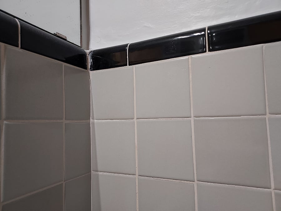 Original tiles but new sink and toilet