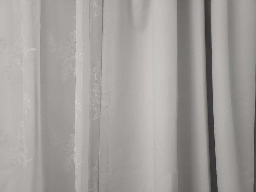 Bedroom windows have vinyl pull down shades as well as shears and black out drapes. Slide right to let the sun in, left to block it out.
