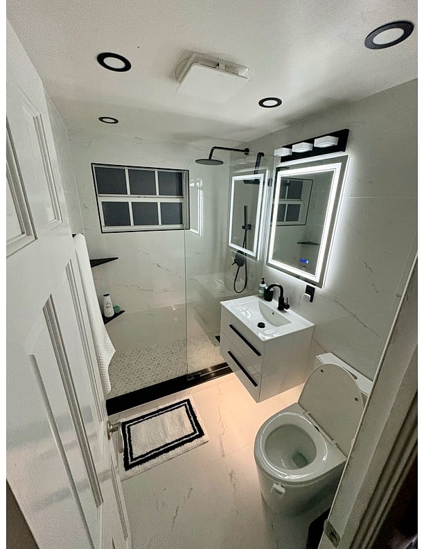 Bathroom #2, next to bedroom 2, bedroom 3, and the living room. 
Luxury, simplicity, functionality! 
Please use the bin to dispose paper or anything else. 
Do not flush down anything. Enjoy the rain shower!
