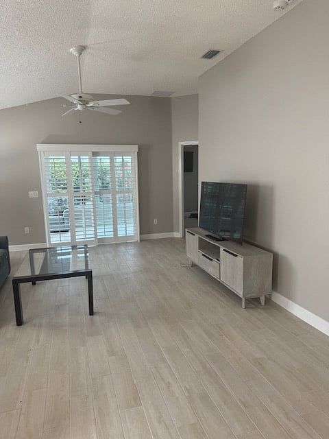 Large living room area with TV, high speed WIFI provided.