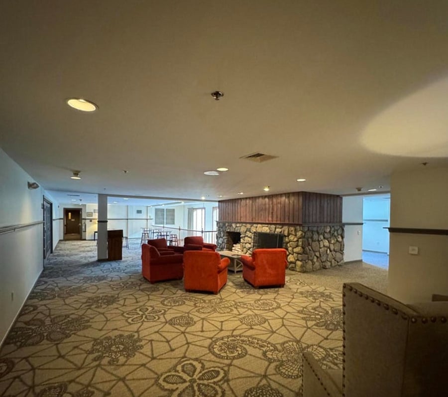 Second-Floor Common Area Just Steps from the Unit. Cozy fireplace, fast Wi-Fi, and tables ideal for reading or remote working.