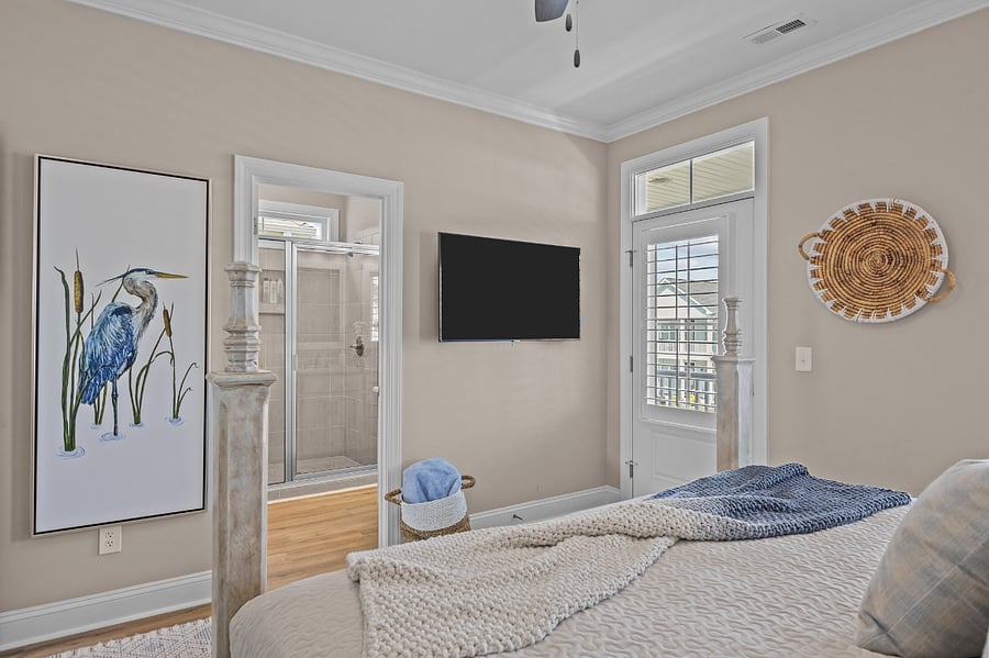 Primary king to full shower, powder room, and walk-in closet
