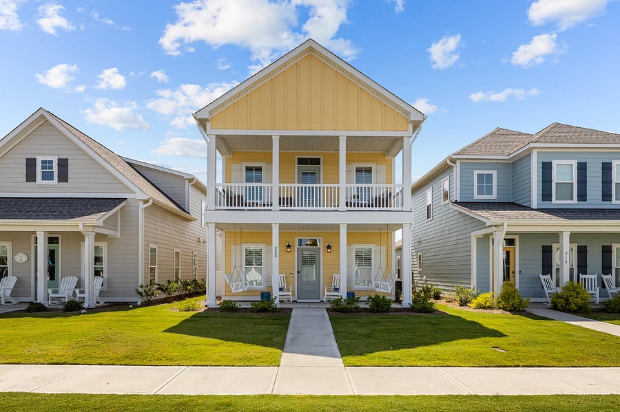 The entire home has plenty of seating, an upper deck, and a front porch