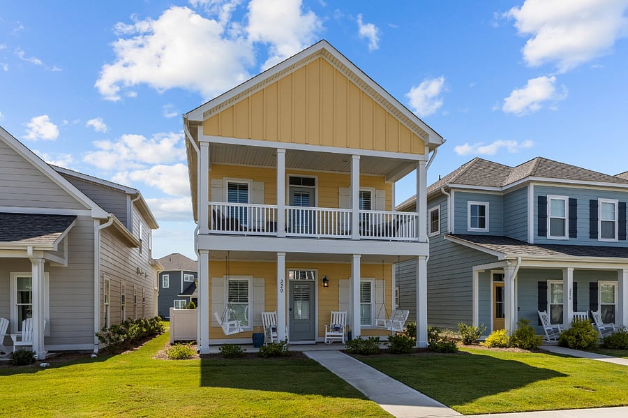 The entire home has plenty of seating, an upper deck, and a front porch
