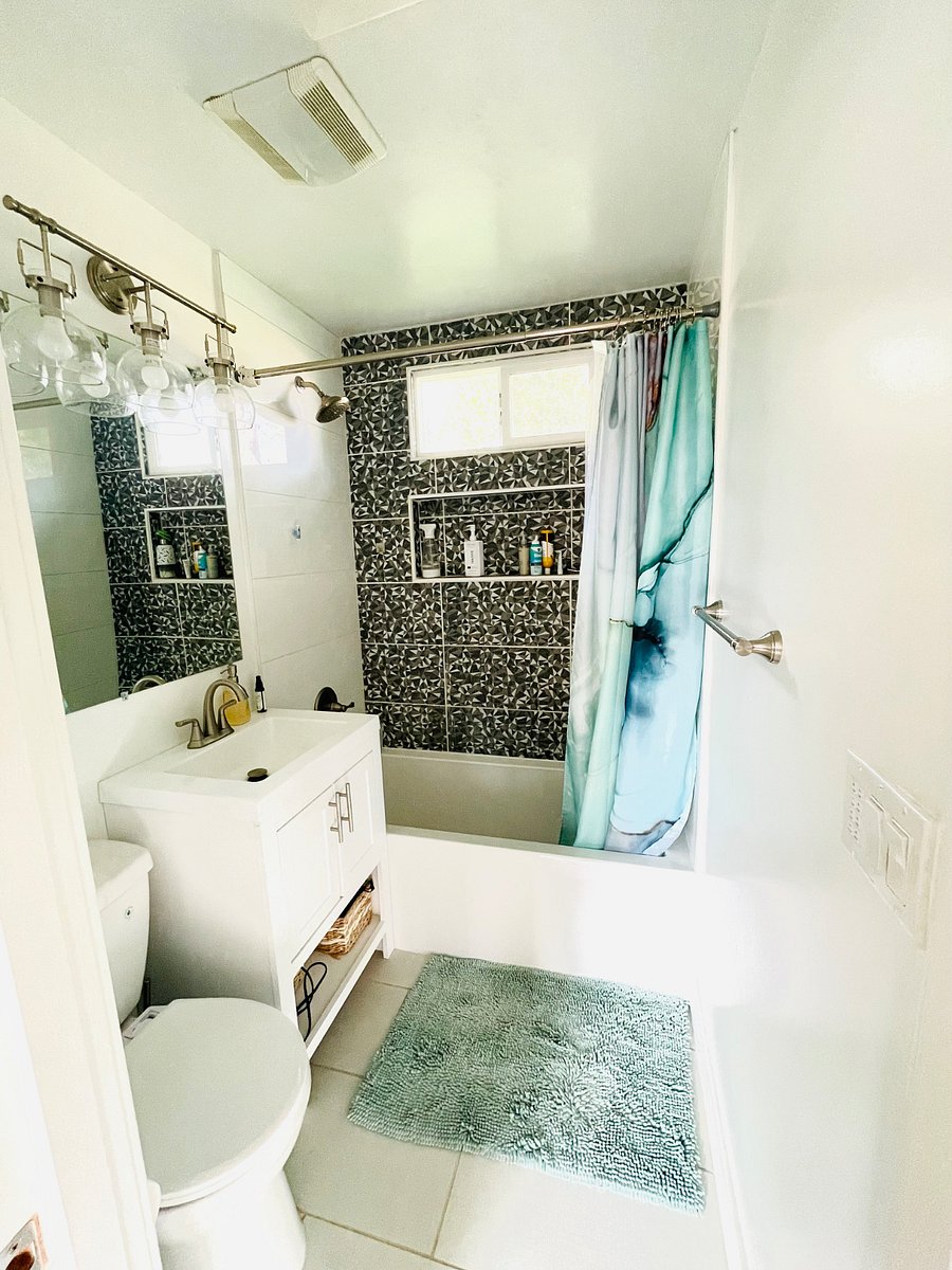 Shared bathroom, with extra storage in hallway
