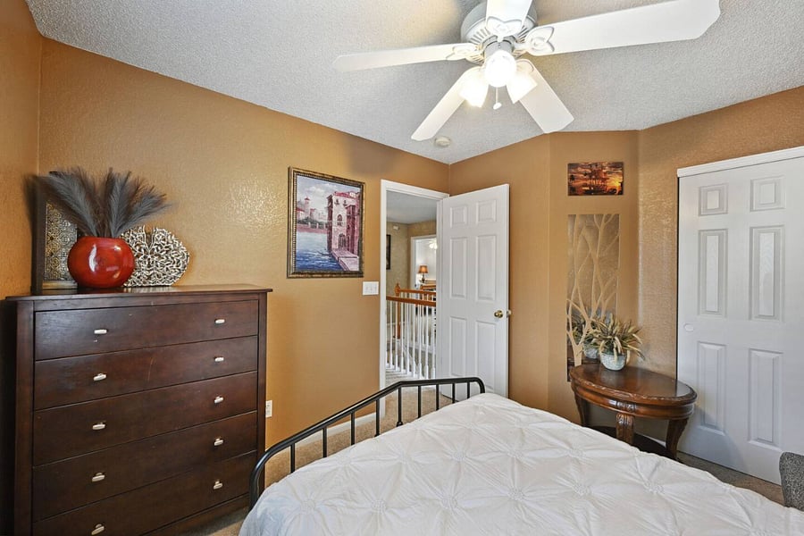 Third bedroom, view to the entry and closet door.
