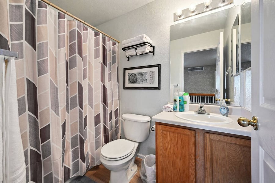Full bathroom; shared; second floor.