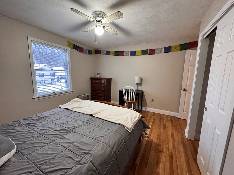 Bedroom with Queen bed, desk and dresser