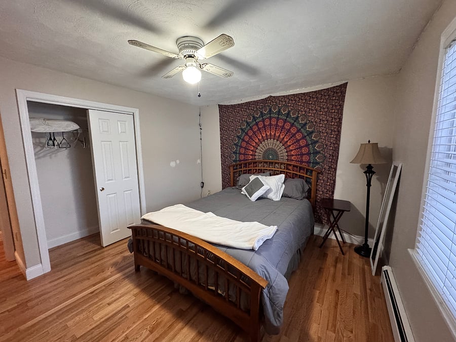 Bedroom with Queen bed, desk and dresser