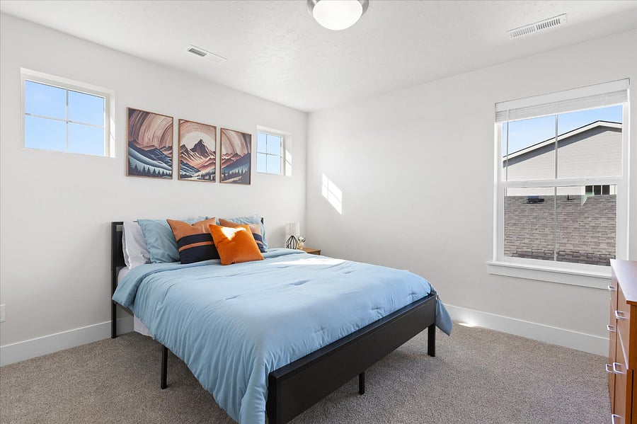 Bedroom 2 has a queen size bed.