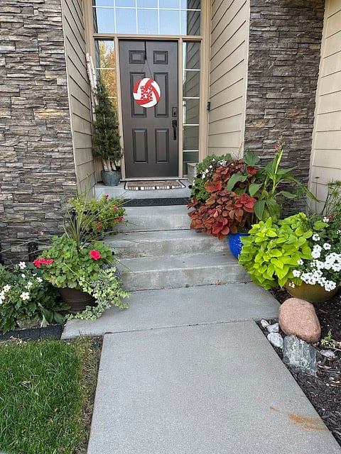 Inviting shared secure entrance with ring doorbell.