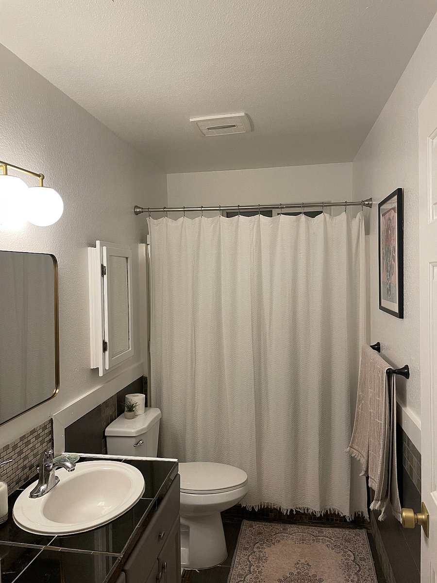 Guest bathroom with full bath and shower