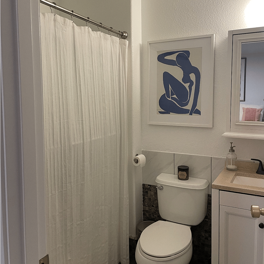 Main bedroom bathroom with full bath and shower