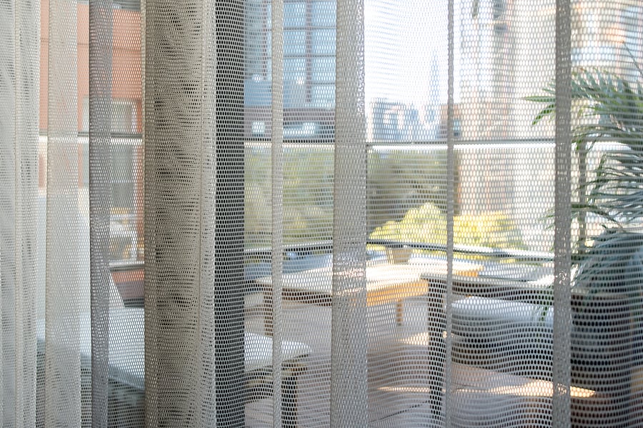 Living room with terrace and Manhattan skyline views.