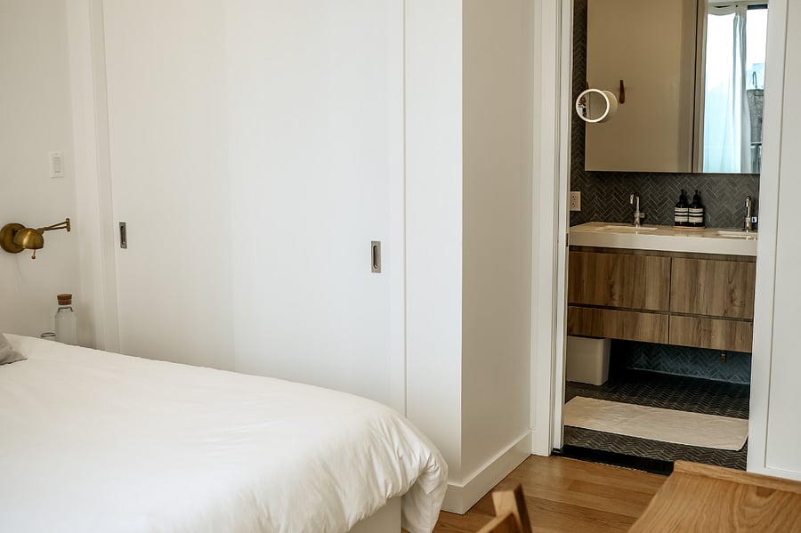 ALONK Suite with ensuite bathroom, private terrace, King bed, wardrobe and dedicated desk.