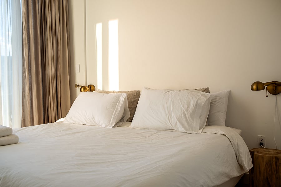 ALONK Suite with ensuite bathroom, private terrace, King bed, wardrobe and dedicated desk.