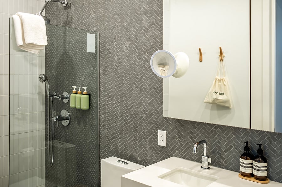 ALONK Suite's ensuite bathroom with walk-in rain shower.