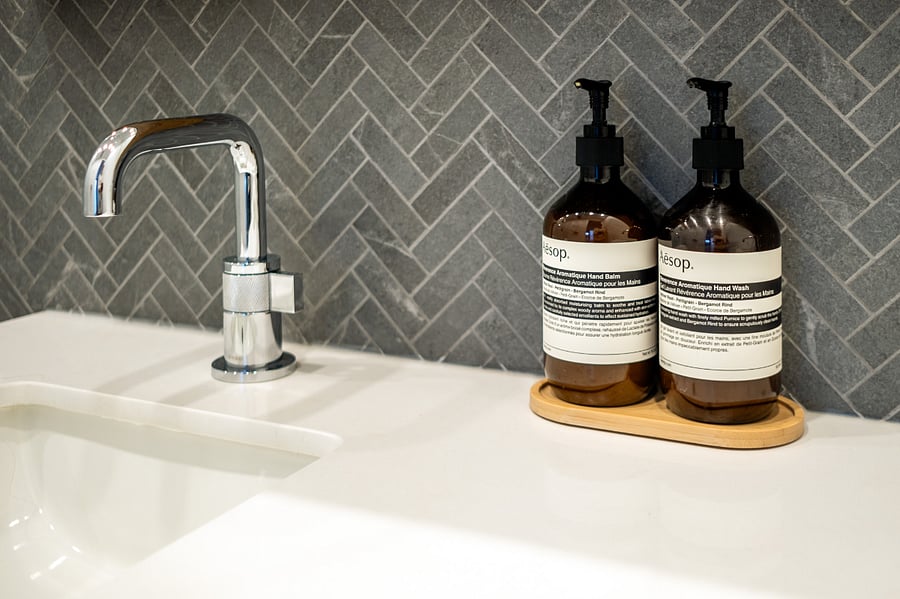 ALONK Suite's ensuite bathroom with walk-in rain shower.