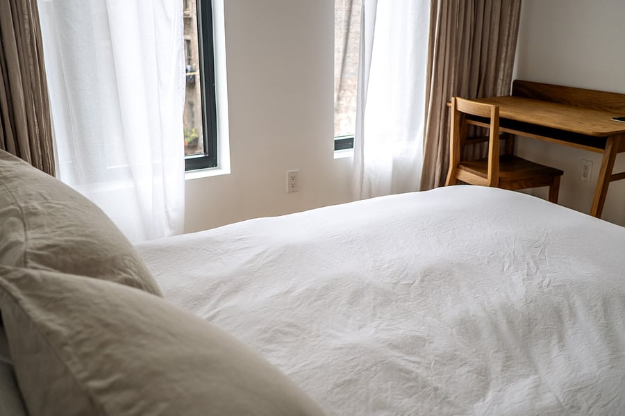 Poet's room with Queen bed, wardrobe and dedicated desk.