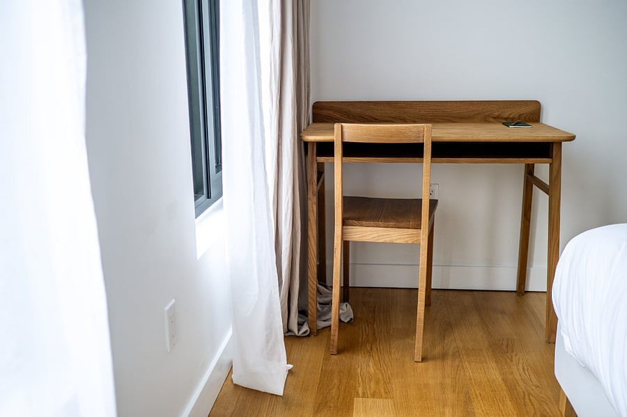 Poet's room with Queen bed, wardrobe and dedicated desk.