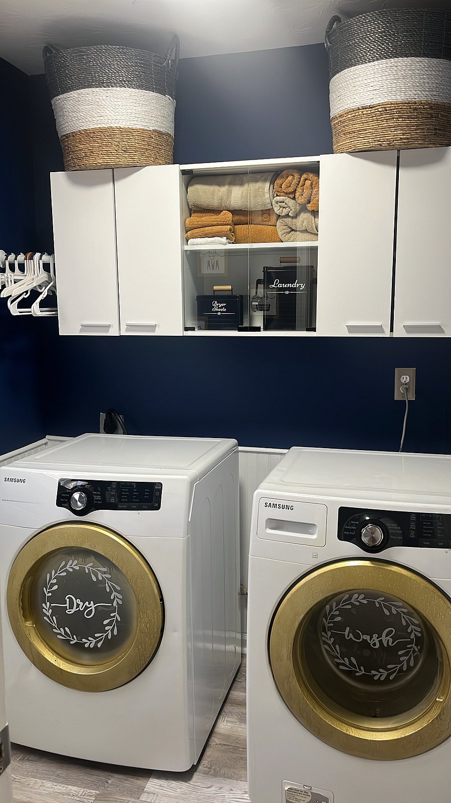 Laundry room-additional towels provided, dryer sheets, tide pods, softener, and stain remover provided. Additional paper towels and toilet paper provided in bins above the cabinet.