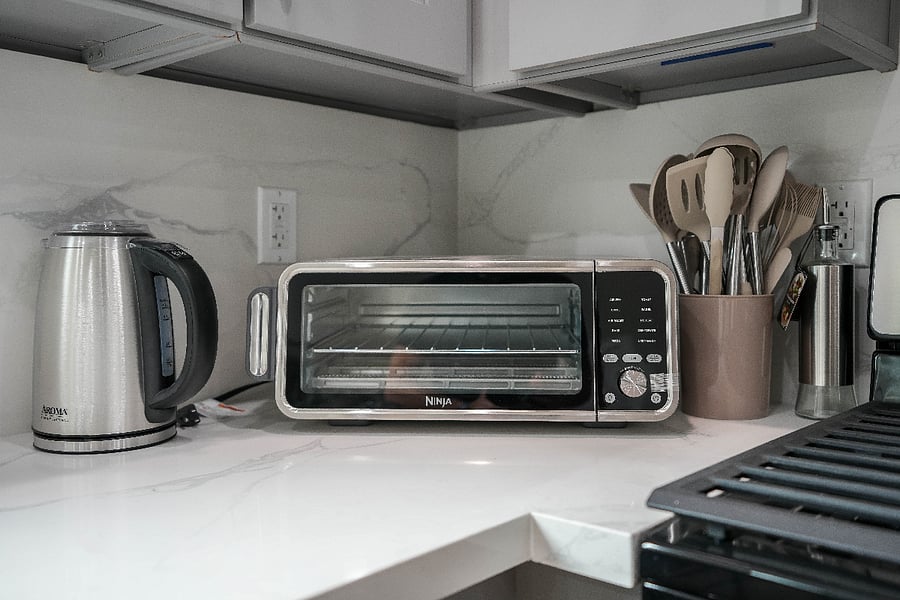 Kitchen with cooking and dining utensils