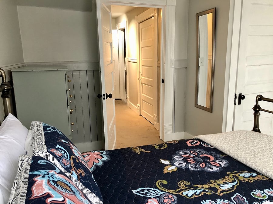 Queen bed, full dresser, cedar-lined closet, smart TV.