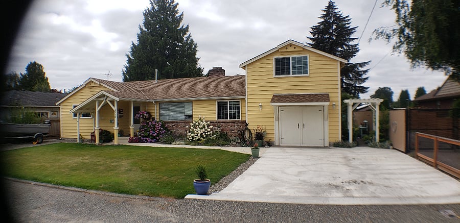 Front of house. Unit is above the garage. Entrance to unit is along the pathway on the right side of the garage.