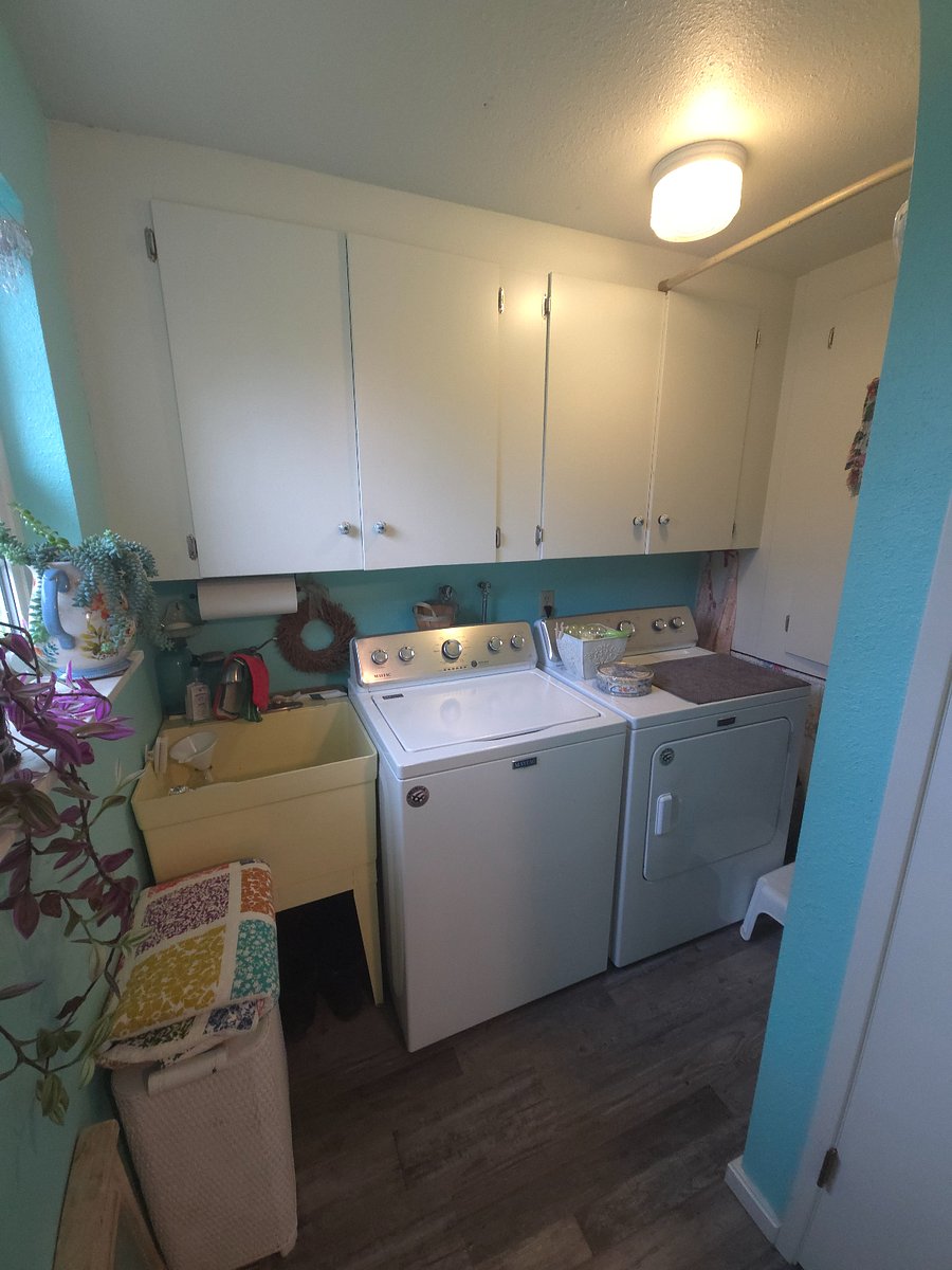 Fairly new washer and dryer, stocked cabinets, laundry sink.