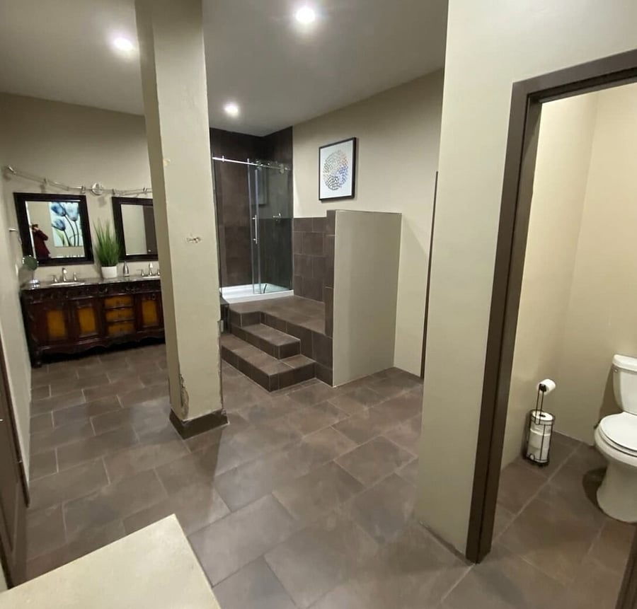 Master bath.  Please note steps to shower.