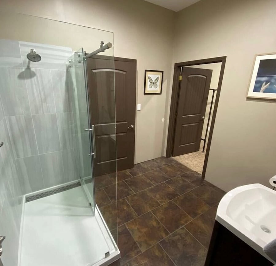 Bathroom between laundry room and fourth bedroom.