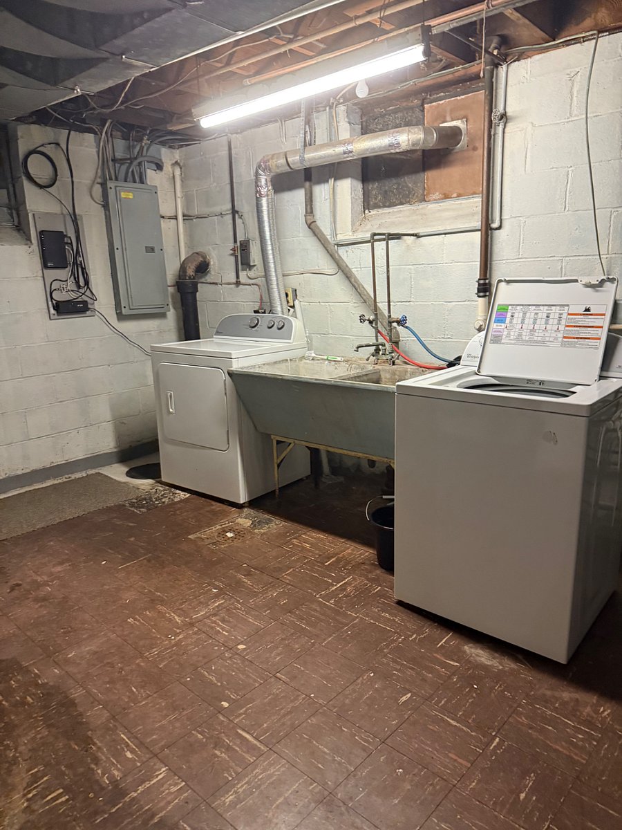 laundry unit, washer & dryer and utility sink
breaker panel to the left of the dryer