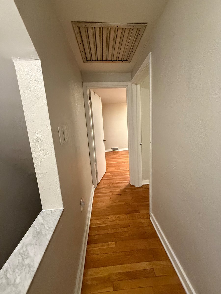 second floor hallway, parallel to staircase