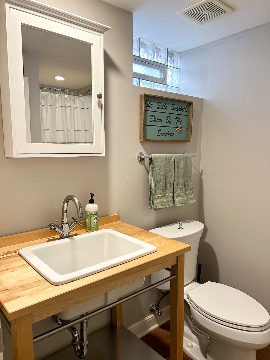 Lower level bathroom with walk-in shower.