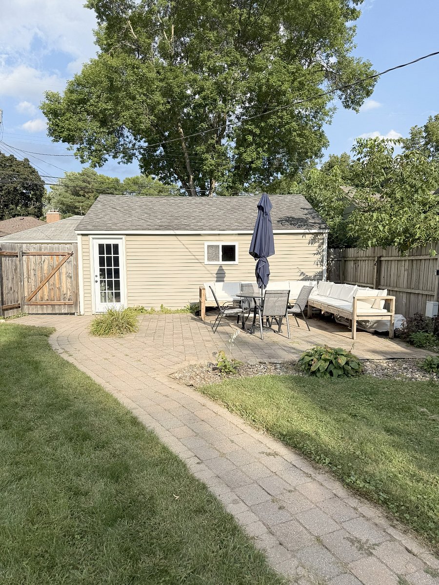 Large fenced-in backyard and patio area perfect for pets, children, or entertaining friends and family.