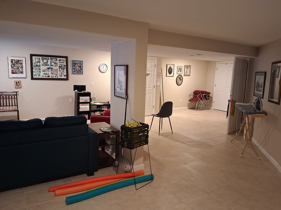 Fully furnished basement with good light, TV, exercise area